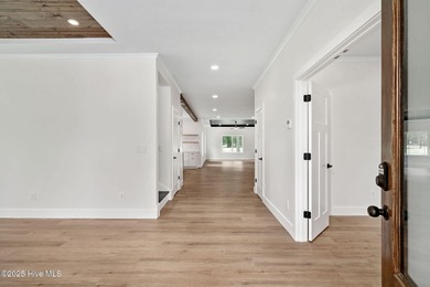 Experience Comfort, Community & Convenience in One of America's on River Landing Golf Course in North Carolina - for sale on GolfHomes.com, golf home, golf lot