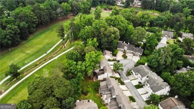 Welcome to this spacious and versatile end-unit townhome in the on Indian Hills Country Club in Georgia - for sale on GolfHomes.com, golf home, golf lot
