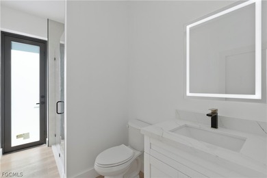 Exclusive new construction waterfront residence that redefines on Burnt Store Golf Club in Florida - for sale on GolfHomes.com, golf home, golf lot