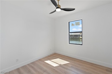 Exclusive new construction waterfront residence that redefines on Burnt Store Golf Club in Florida - for sale on GolfHomes.com, golf home, golf lot