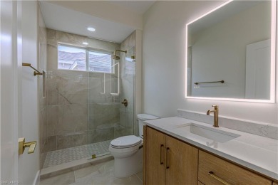 Fully Remodeled Lakeside Luxury in Troon Lakes at Pelican Marsh
 on Pelican Marsh Golf Club in Florida - for sale on GolfHomes.com, golf home, golf lot