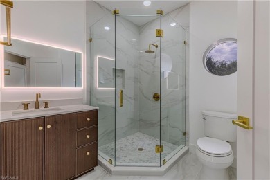 Fully Remodeled Lakeside Luxury in Troon Lakes at Pelican Marsh
 on Pelican Marsh Golf Club in Florida - for sale on GolfHomes.com, golf home, golf lot
