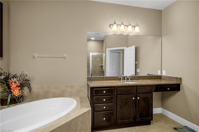 Spectacular sunsets, rare double water views, and a front-row on The Golf Lodge At the Quarry in Florida - for sale on GolfHomes.com, golf home, golf lot