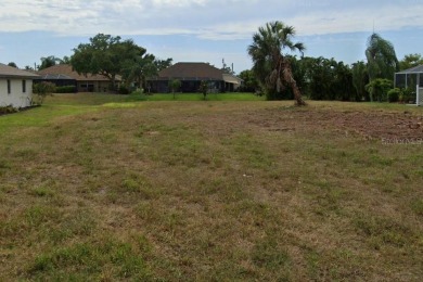 Build your dream home on this stunning freshwater canal lot in on Pinemoor West Golf Club in Florida - for sale on GolfHomes.com, golf home, golf lot