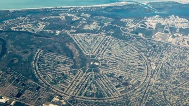 Build your dream home on this stunning freshwater canal lot in on Pinemoor West Golf Club in Florida - for sale on GolfHomes.com, golf home, golf lot