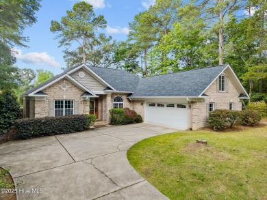 Located in the gated Woodlake Country Club community.

Tucked on Woodlake Country Club in North Carolina - for sale on GolfHomes.com, golf home, golf lot