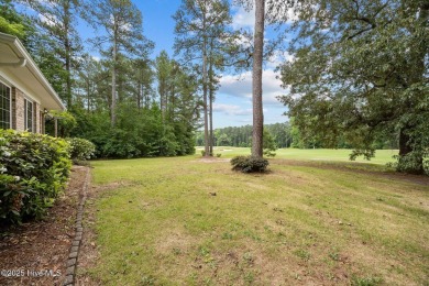 Located in the gated Woodlake Country Club community.

Tucked on Woodlake Country Club in North Carolina - for sale on GolfHomes.com, golf home, golf lot