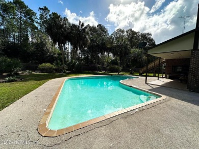 This 3,473 sq ft, two-story brick and stucco home offers four on Starke Golf and Country Club in Florida - for sale on GolfHomes.com, golf home, golf lot