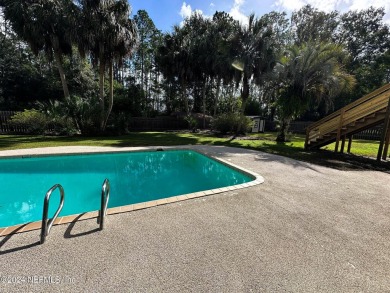 This 3,473 sq ft, two-story brick and stucco home offers four on Starke Golf and Country Club in Florida - for sale on GolfHomes.com, golf home, golf lot