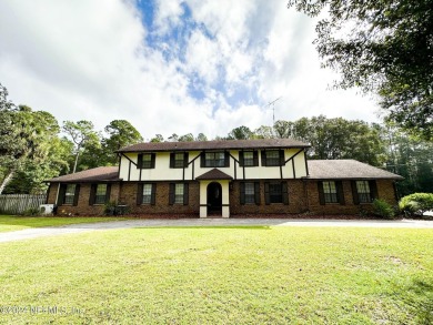 This 3,473 sq ft, two-story brick and stucco home offers four on Starke Golf and Country Club in Florida - for sale on GolfHomes.com, golf home, golf lot