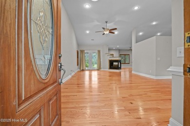 Located in the gated Woodlake Country Club community.

Tucked on Woodlake Country Club in North Carolina - for sale on GolfHomes.com, golf home, golf lot