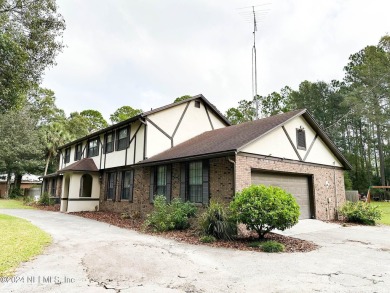 This 3,473 sq ft, two-story brick and stucco home offers four on Starke Golf and Country Club in Florida - for sale on GolfHomes.com, golf home, golf lot