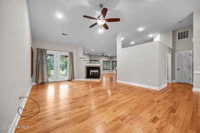 Located in the gated Woodlake Country Club community.

Tucked on Woodlake Country Club in North Carolina - for sale on GolfHomes.com, golf home, golf lot