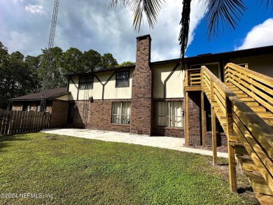 This 3,473 sq ft, two-story brick and stucco home offers four on Starke Golf and Country Club in Florida - for sale on GolfHomes.com, golf home, golf lot