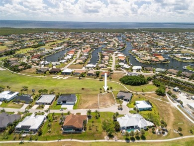PREMIUM GOLF COURSE LOT IN PUNTA GORDA ISLES! Oversized quiet on Saint Andrews South Golf Club in Florida - for sale on GolfHomes.com, golf home, golf lot