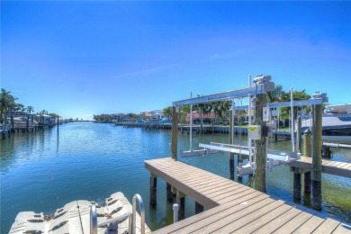 Outstanding Dana Shores waterfront masterpiece! Complete on Rocky Point Golf Course in Florida - for sale on GolfHomes.com, golf home, golf lot