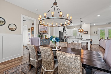 Set behind the gates of Cypress River Plantation, this modern on Heron Point Golf Club in South Carolina - for sale on GolfHomes.com, golf home, golf lot