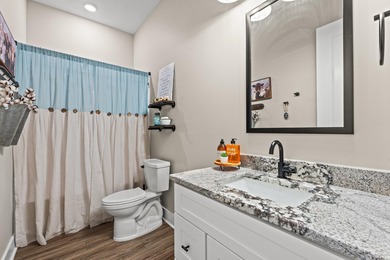 Set behind the gates of Cypress River Plantation, this modern on Heron Point Golf Club in South Carolina - for sale on GolfHomes.com, golf home, golf lot