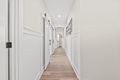 Set behind the gates of Cypress River Plantation, this modern on Heron Point Golf Club in South Carolina - for sale on GolfHomes.com, golf home, golf lot