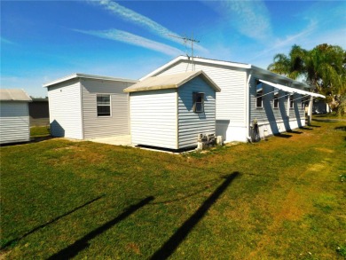This 1997 Palm Harbor home with 2X6 exterior construction, is a on Betmar Acres Golf Club in Florida - for sale on GolfHomes.com, golf home, golf lot