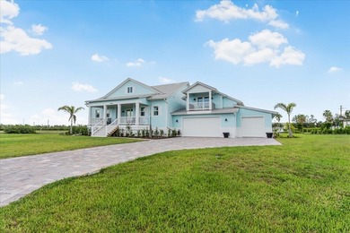 NEW CONSTRUCTION!!-  Completed Luxury Waterfront Estate - on Twin Isles Country Club in Florida - for sale on GolfHomes.com, golf home, golf lot