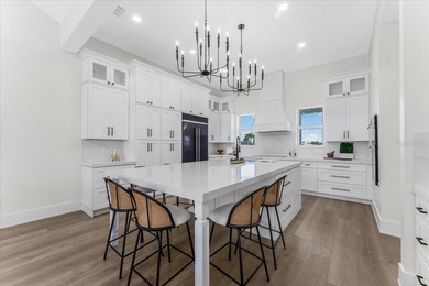 NEW CONSTRUCTION!!-  Completed Luxury Waterfront Estate - on Twin Isles Country Club in Florida - for sale on GolfHomes.com, golf home, golf lot