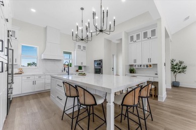 NEW CONSTRUCTION!!-  Completed Luxury Waterfront Estate - on Twin Isles Country Club in Florida - for sale on GolfHomes.com, golf home, golf lot