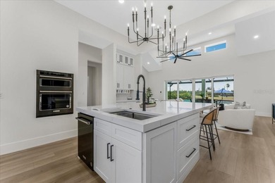 NEW CONSTRUCTION!!-  Completed Luxury Waterfront Estate - on Twin Isles Country Club in Florida - for sale on GolfHomes.com, golf home, golf lot