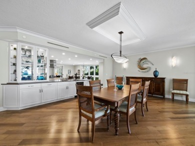 This exceptional 3-bedroom, 3.5-bathroom + family room residence on Longboat Key Golf Club Resort in Florida - for sale on GolfHomes.com, golf home, golf lot