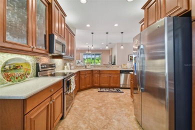 Located minutes from walking paths, clubhouse, all amenities and on Caloosa Greens Executive Golf Course in Florida - for sale on GolfHomes.com, golf home, golf lot