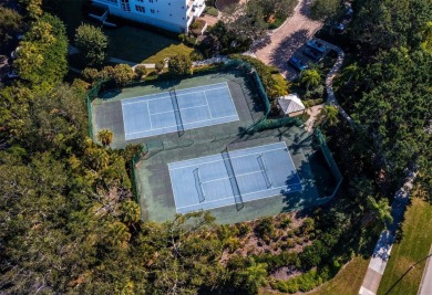This exceptional 3-bedroom, 3.5-bathroom + family room residence on Longboat Key Golf Club Resort in Florida - for sale on GolfHomes.com, golf home, golf lot