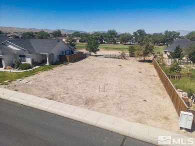 This lot backs a green on Desert Lakes Golf Course.  All on The Golf Club of Fernley in Nevada - for sale on GolfHomes.com, golf home, golf lot