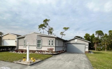 This Casa Grande model home has a view of the golf course from on Del Tura Golf and Country Club in Florida - for sale on GolfHomes.com, golf home, golf lot