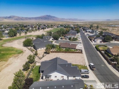 This lot backs a green on Desert Lakes Golf Course.  All on The Golf Club of Fernley in Nevada - for sale on GolfHomes.com, golf home, golf lot