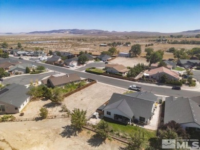 This lot backs a green on Desert Lakes Golf Course.  All on The Golf Club of Fernley in Nevada - for sale on GolfHomes.com, golf home, golf lot