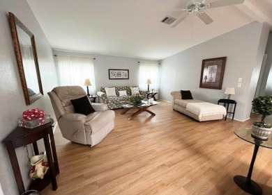 This Casa Grande model home has a view of the golf course from on Del Tura Golf and Country Club in Florida - for sale on GolfHomes.com, golf home, golf lot