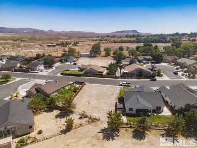 This lot backs a green on Desert Lakes Golf Course.  All on The Golf Club of Fernley in Nevada - for sale on GolfHomes.com, golf home, golf lot