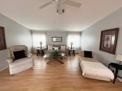 This Casa Grande model home has a view of the golf course from on Del Tura Golf and Country Club in Florida - for sale on GolfHomes.com, golf home, golf lot