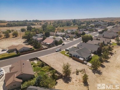 This lot backs a green on Desert Lakes Golf Course.  All on The Golf Club of Fernley in Nevada - for sale on GolfHomes.com, golf home, golf lot