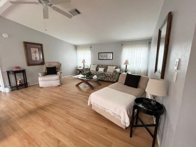 This Casa Grande model home has a view of the golf course from on Del Tura Golf and Country Club in Florida - for sale on GolfHomes.com, golf home, golf lot