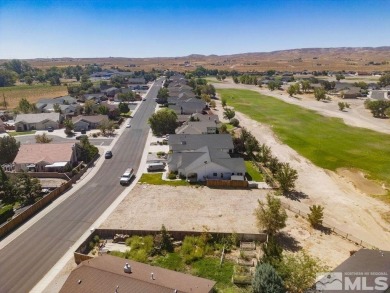 This lot backs a green on Desert Lakes Golf Course.  All on The Golf Club of Fernley in Nevada - for sale on GolfHomes.com, golf home, golf lot