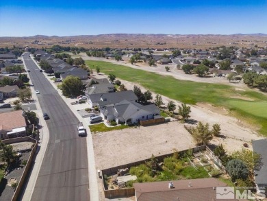 This lot backs a green on Desert Lakes Golf Course.  All on The Golf Club of Fernley in Nevada - for sale on GolfHomes.com, golf home, golf lot