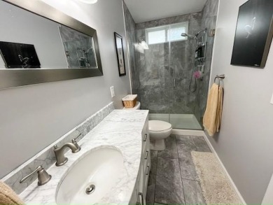 This Casa Grande model home has a view of the golf course from on Del Tura Golf and Country Club in Florida - for sale on GolfHomes.com, golf home, golf lot