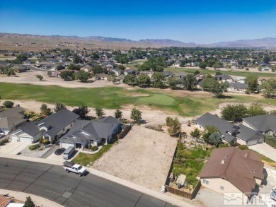 This lot backs a green on Desert Lakes Golf Course.  All on The Golf Club of Fernley in Nevada - for sale on GolfHomes.com, golf home, golf lot