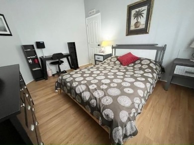 This Casa Grande model home has a view of the golf course from on Del Tura Golf and Country Club in Florida - for sale on GolfHomes.com, golf home, golf lot