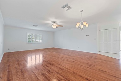 Welcome home to this spacious 2-bedroom, 2-bath residence that on Falcon Watch Golf Club in Florida - for sale on GolfHomes.com, golf home, golf lot