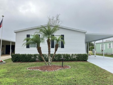 Welcome to this beautifully maintained Palm Harbor home on Fairways Country Club in Florida - for sale on GolfHomes.com, golf home, golf lot