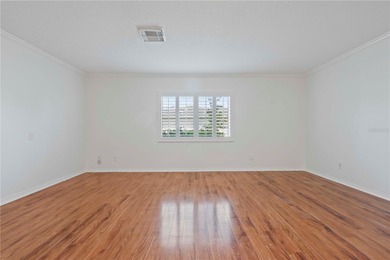 Welcome home to this spacious 2-bedroom, 2-bath residence that on Falcon Watch Golf Club in Florida - for sale on GolfHomes.com, golf home, golf lot