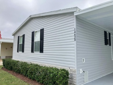 Welcome to this beautifully maintained Palm Harbor home on Fairways Country Club in Florida - for sale on GolfHomes.com, golf home, golf lot