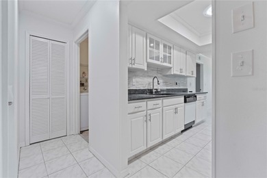 Welcome home to this spacious 2-bedroom, 2-bath residence that on Falcon Watch Golf Club in Florida - for sale on GolfHomes.com, golf home, golf lot